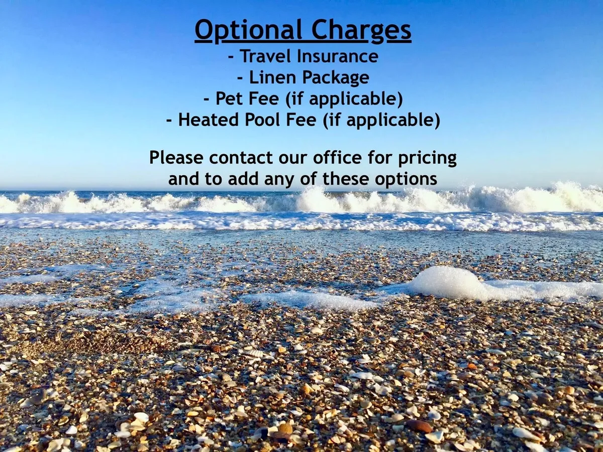 A tranquil stretch of sandy Atlantic beach, with gentle ocean waves lapping the shore. Seashells dot the sand under a clear blue sky, suggesting a perfect spot for building sandcastles, beachcombing, and wave splashing. The atmosphere is inviting and family-friendly, ideal for children.